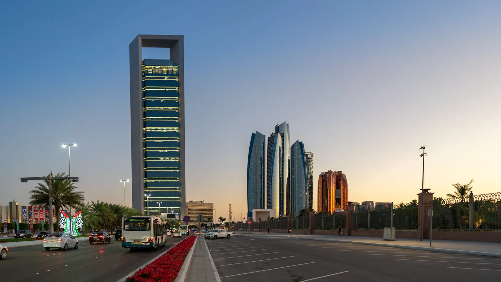 Abu Dhabi daytime skyline showing the ADNOC tower and Etihad Towers, representing the emirate where holiday home licensing is regulated by the Department of Culture and Tourism